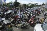 People riding motorbikes and cars packed streets in Banda Aceh, driving to higher ground after an 8.6 magnitude earthquake struck Sumatra on Wednesday (April 11th). Residents around the region evacuated buildings, mindful of the huge 2004 earthquake and tsunami disaster. There were no immediate reports of casualties or damage. [Junaidi Hanafiah/Reuters]