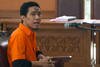 Separiano, tersangka dalam komplotan untuk mengebom Kedutaan Besar Myanmar di Jakarta, berbicara pada hari pertama sidangnya di Jakarta pada tanggal 6 November. Dia mengatakan kepada pengadilan bahwa dia menggunakan uang yang disumbangkan selama kelompok studi Islam (Majelis Taklim) untuk membeli bahan peledak. [Bay Ismoyo/AFP]