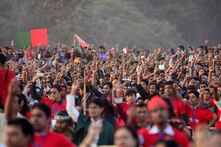 Bangladeshis take an oath to resist Jamaat-e-Islami violence at a rally in Dhaka on December 16th. Jamaat student wing Islami Chhatra Shibir is the world's third most active non-state armed group, an international think tank announced Monday (February 24th). [Munir uz Zaman/AFP]