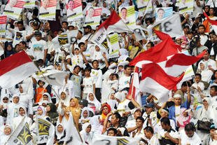 Supporters of Indonesia's Prosperous Justice Party (PKS) rally at Bung Karno Stadium in Jakarta on March 16th. [Adek Berry/AFP]