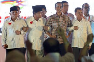 Presidential candidates Prabowo Subianto (second, left) and Joko 