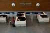 A passenger waits May 2nd at the immigration counter in the new terminal at Kuala Lumpur International Airport (KLIA2). Iranians entering Malaysia can no longer obtain visas upon arrival. [Manan Vatsyayana/AFP]