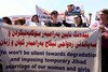  Kurdish protesters denounce the Islamic State of Iraq and the Levant (ISIL) during a demonstration Sunday (August 24th) outside UN offices in Erbil, Iraq. Outgoing Indonesian President Susilo Bambang Yudhoyono called ISIL "embarrassing" to all Muslims. [Safin Hamed/AFP] 