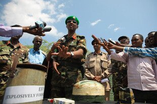 Major General Fred Mugisha, Force commander of the African Union Mission in Somalia (AMISOM) shows IEDs found on Mogadishu streets and defused in November 2011. On the defensive after its latest leader, Bilal al-Berjawi (Abu Hafsa) was killed in a January 23rd airstrike, Al-Qaeda affiliate Al Shabaab now resorts to planting roadside bombs. [Reuters]