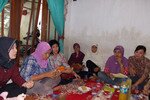 At a July 24th meeting, members of the Independent Women's Forum (FPM) in Jombang, East Java share their experiences of domestic violence. The forum provides a place for women to support one another and learn entrepreneurial skills. [Michael Watopa/Khabar]