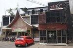 Café de'Most in South Jakarta (right) sits dark and empty two weeks after it was raided by a hardline Muslim group. Police sealed the café for serving alcohol during Ramadan – but also charged 23 people in the July 29th attack. [Elisabeth Oktofani/Khabar]