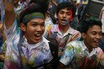 High school students celebrate the ending of the four-day national exams in Medan, North Sumatra province on April 19th, 2012. Experts are urging Indonesia to implement a deradicalisation curriculum in schools, seen as an ideal place for extremists to find new recruits.[Roni Bintang/Reuters]