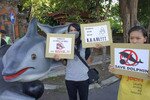 Animal rights activists stage a rally in Bali to protest the use of dolphins in recreation facilities and traveling circuses. In February, a pair of the legally protected wild animals was being kept for display at a restaurant in Bali. [Photo: Jakarta Animal Aid Network].