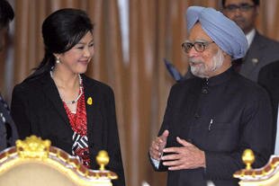 Thai Prime Minister Yingluck Shinawatra (left) talks with her Indian counterpart Manmohan Singh prior to a press conference in Bangkok on Thursday (May 30th). On Friday, Yingluck will lead a business delegation to Sri Lanka and the Maldives in an effort to boost bilateral trade. [Pornchai Kittiwongsakul/AFP]