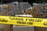 Police display one tonne of marijuana, valued at $237,000, seized during an operation in Jakarta on March 13th. In partnership with the National Narcotics Agency (BNN), Jakarta Police offered free rehab to drug addicts during the month of June. [Adek Berry/AFP]
