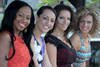 Para kontestan Miss World 2013 (dari kiri ke kanan) Kirtis Malone (Kepulauan Virgin Britania Raya), Penina Maree Paeu (Samoa), Eva Dombrovska (Latvia), dan Jacqueline Steenbeek (Belanda) berpose dalam sesi foto, Rabu (4 September) di Bali. [AFP/Miss World]