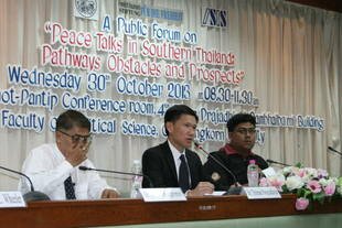 Analyst Thitinan Pongsudhirak (centre) addresses a forum on prospects for peace in southern Thailand at Chulalongkorn University on October 30th. Danyal Abdulloh (right), an activist from the conflict zone, said youth there want peace and accommodation of 