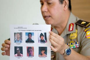 National Police spokesman Boy Rafli Amar, displaying images of six suspected terrorists killed in a New Year's Eve raid, said Friday (January 3rd) the group was planning further terror attacks. [Bay Ismoyo/AFP]