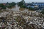 Garbage covers a stretch of the Ciliwung River in Jakarta on January 21st, as floods hit the Indonesian capital and its satellite towns. [Adek Berry/AFP]