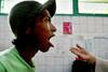 Drug addict Yusuf is checked by a Jakarta clinic doctor in June 2006. Indonesia is shifting from punishment to rehabilitation to tackle its growing drug use problem. [Adek Berry/AFP] 